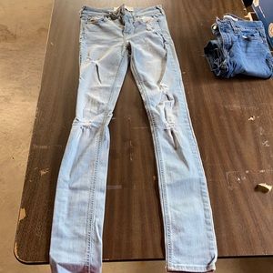 Ripped light wash skinny jeans